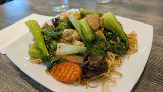 Vegan vegetable stir-fry noodles served at Saigon Vegan, a family-owned vegan Vietnamese restaurant in Garden Grove, CA